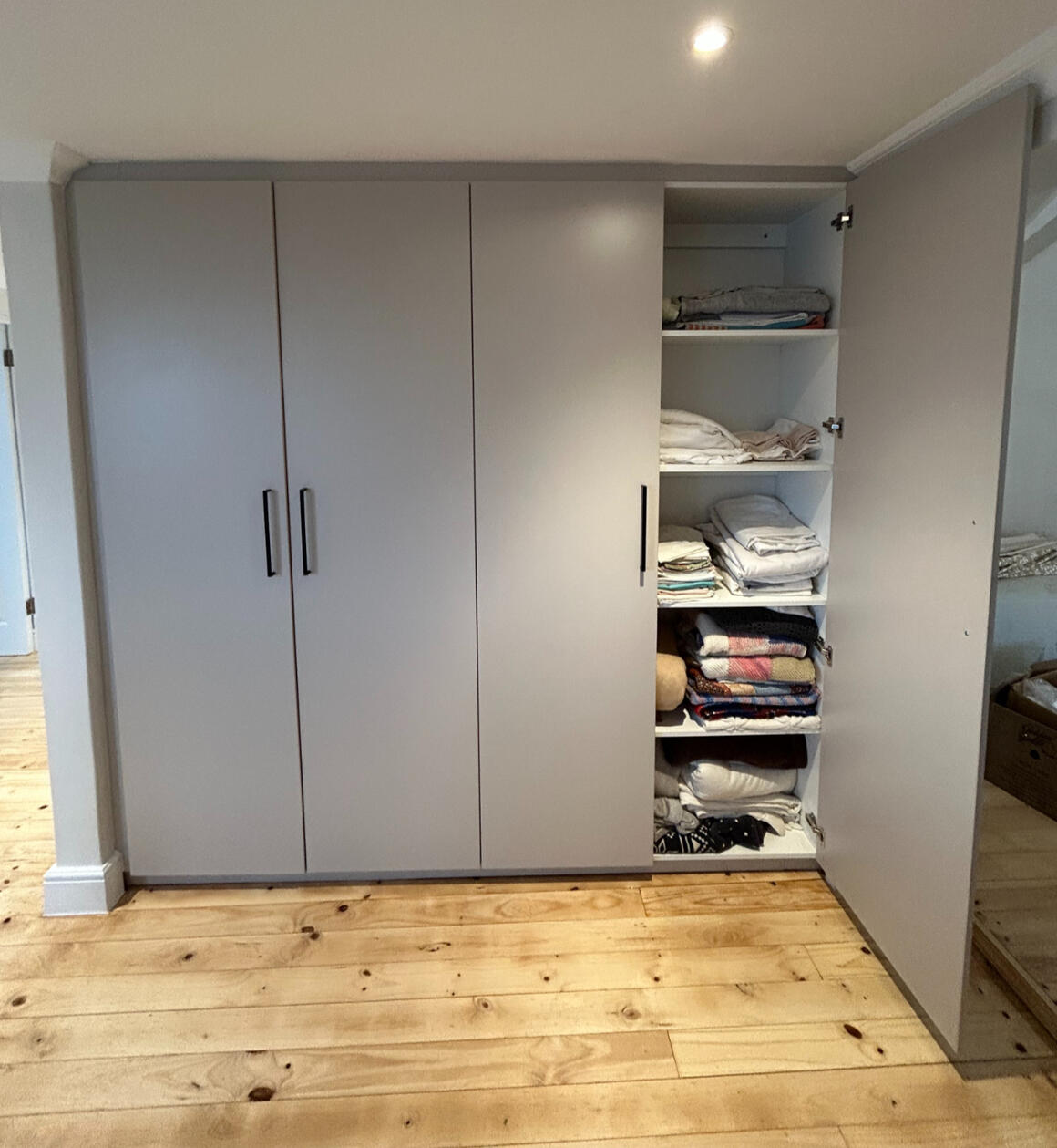 Linen and Storage Cupboards Space for linen and extra storage was cleverly incorporated into a loft landing.