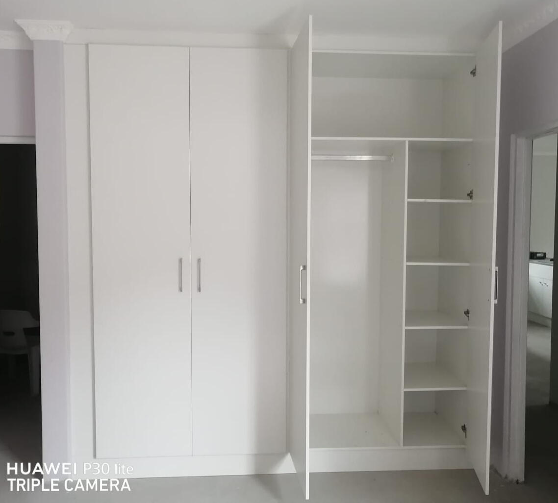 Built in Cupboards Clean, white and modern built-in bedroom cupboards.